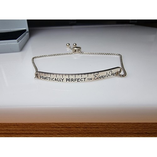 335 - A 925 silver adjustable bracelet by Disney marked with the Mary Poppins phrase 