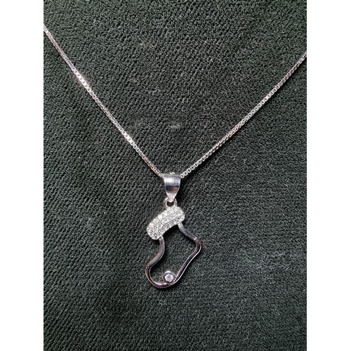 337 - A 925 silver Christmas stocking pendant inset with sparkly crystal CZ stones on an 18