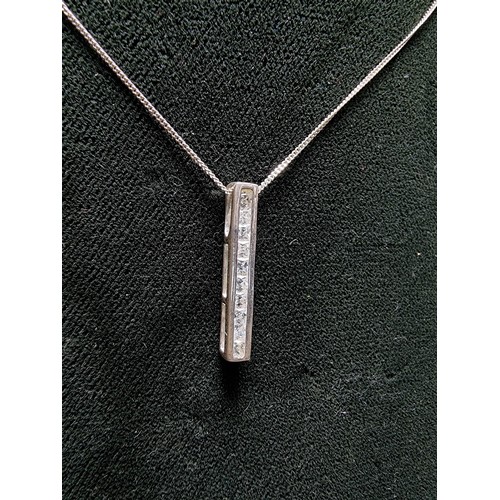 347 - A 925 silver bar pendant channel set with sparkly crystal CZ stones, set on an 18