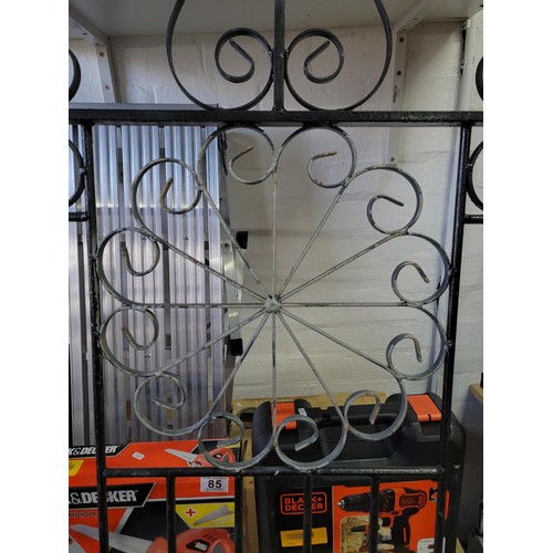 87 - Large wrought iron gate with scroll design complete with hinges 193cm high 97cm wide