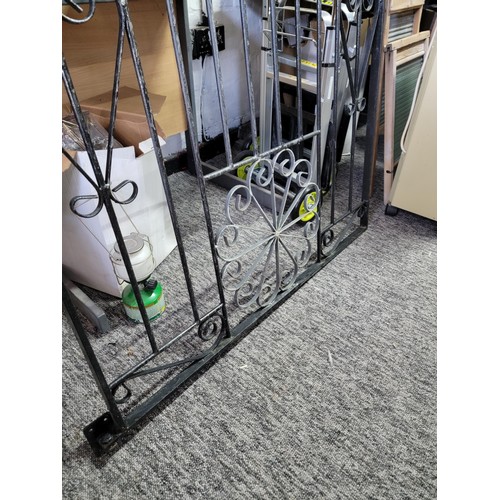 87 - Large wrought iron gate with scroll design complete with hinges 193cm high 97cm wide