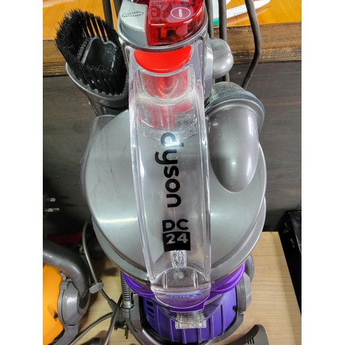 96 - Purple Dyson DC 24 fully refurbished in full working order