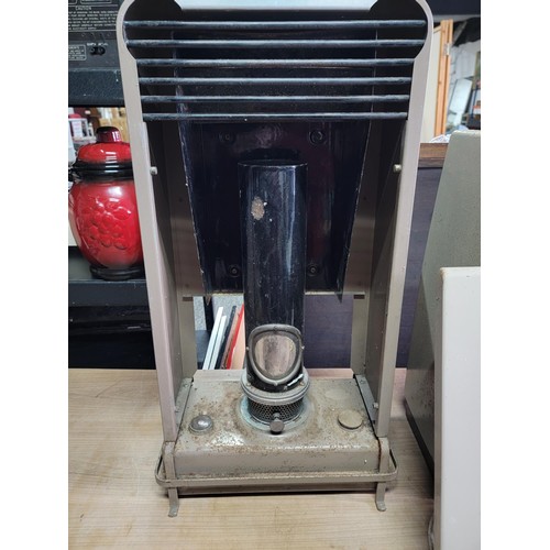 101 - Vintage Aladdin paraffin heater with fuel tank to the base along with a vintage Radiation Sun house ... 