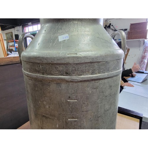 104 - Large 8 litre aluminium milk churn by Guineys Daries Ltd in good order complete with lid 81cm