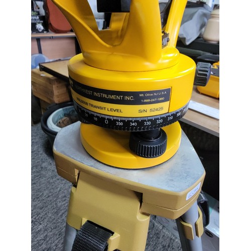 129 - NSL500B transit level, theodolite cased along with tripod and 5 meter pole all in excellent conditio... 