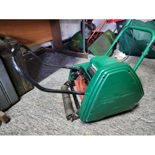 134 - Qualcast classic 30 lawn mower electric complete with carry box