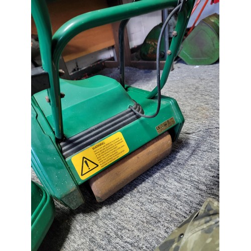 134 - Qualcast classic 30 lawn mower electric complete with carry box