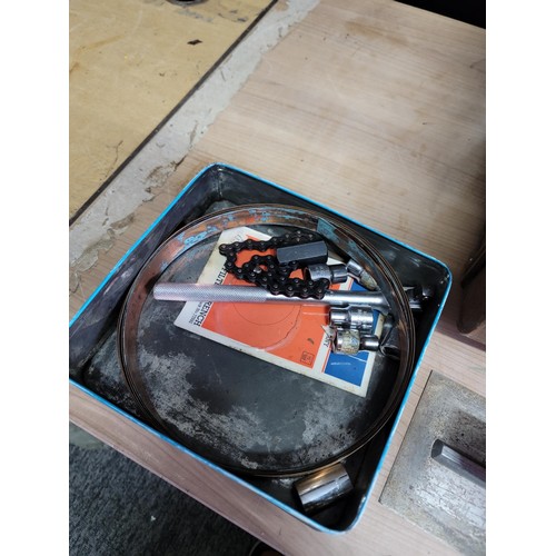 136 - Large metal chest containing a quantity of tools inc saw, wrench, blow torch cap, spanners, screwdri... 