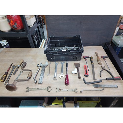 140 - Crate containing a large quantity of tools inc spanners, chisels, belly drill etc