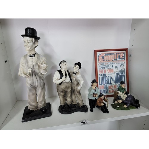 201 - A quantity of Laurel and Hardy figures, some made by Global 4 in total along with a reproduction emp... 