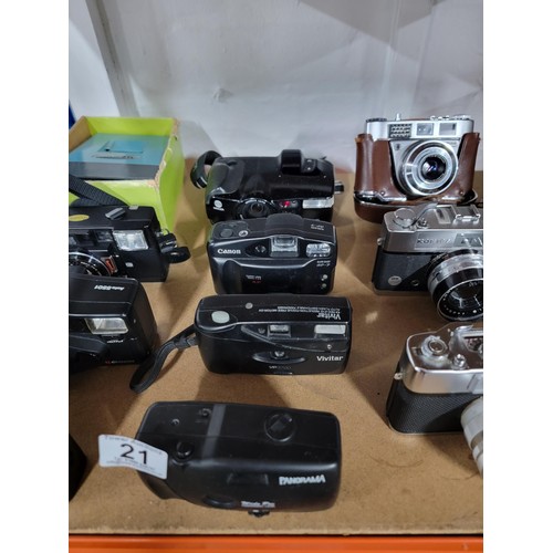 21 - Large quantity of 18 cameras inc Fuji Film DL-312, Nikon F-601, Nikon F 50, Canon Sure shot zoom XL ... 