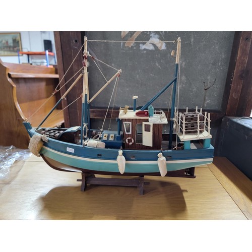 209 - Collectable trawler complete with rigging and acessories in good order measures 38cm high by 46cm hi... 