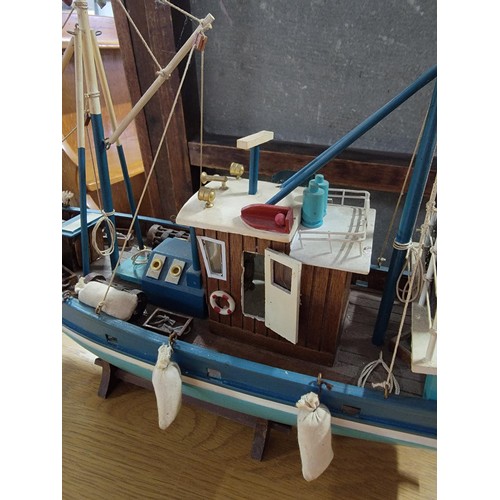 209 - Collectable trawler complete with rigging and acessories in good order measures 38cm high by 46cm hi... 