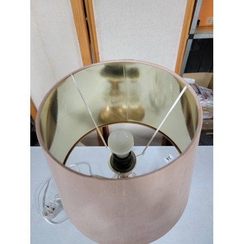 27 - TJX modern table lamp with plastic base and gold coloured shade in good order stands at 50cm high