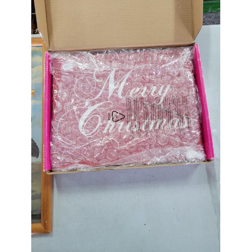 32 - 2x boxed hardly used illuminated canvases one depicting Merry Christmas the other of a reindeer alon... 