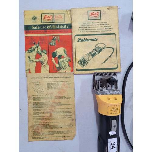 34 - Lister hand held electric shearing machine 45w by Stablemate complete with instructions along with a... 