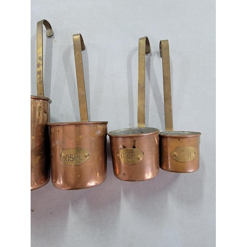 35 - Collection of 5x vintage graduated copper measuring cups from 1 litre to .25 litre in good order alo... 