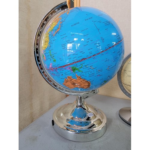 39 - Collection of 2x terrestrial globes in good order, one is illuminated complete with power cable, tal... 