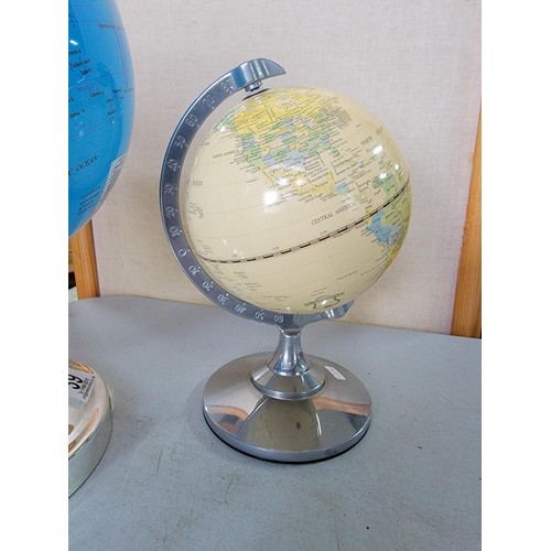 39 - Collection of 2x terrestrial globes in good order, one is illuminated complete with power cable, tal... 