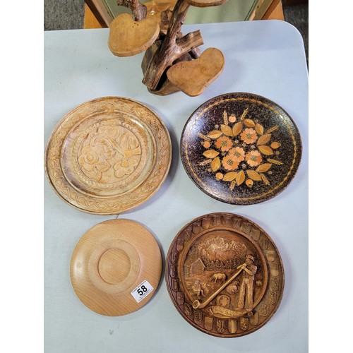 58 - 4 wooden decorative plates inc a hand carved Swiss plate along with a toadstool formed small display... 