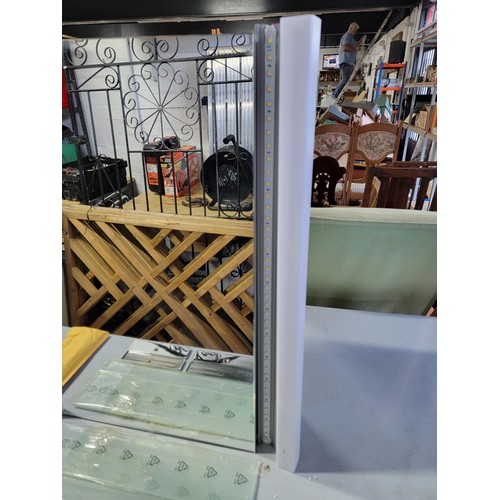 69 - Bathroom mirrored cabinet with accessories LED lights to sides, two glass shelves inside in good ord... 