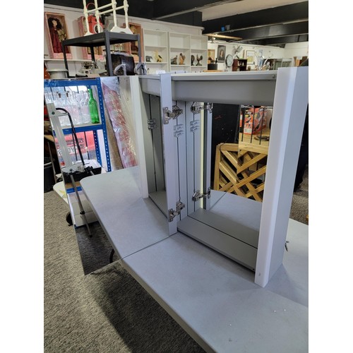 69 - Bathroom mirrored cabinet with accessories LED lights to sides, two glass shelves inside in good ord... 