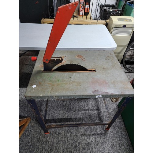 81 - Large Luts table circular saw complete with power cable with on and off button, saw has one tooth mi... 