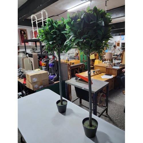 83 - 2x faux orange trees, standing in pots, each stands at 115cm