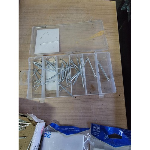 167 - Box of shed odds inc split pins, jubilee clips, new and sealed light switches and dimmer switches et... 