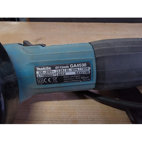 169 - Makita 720w electric grinder complete with powere cable and disk remover along with a quantity of Fe... 