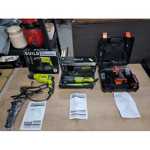 173 - 3x tools inc a Guild 750w hammer drill comes with an unopened bag containing handle and depth measur... 