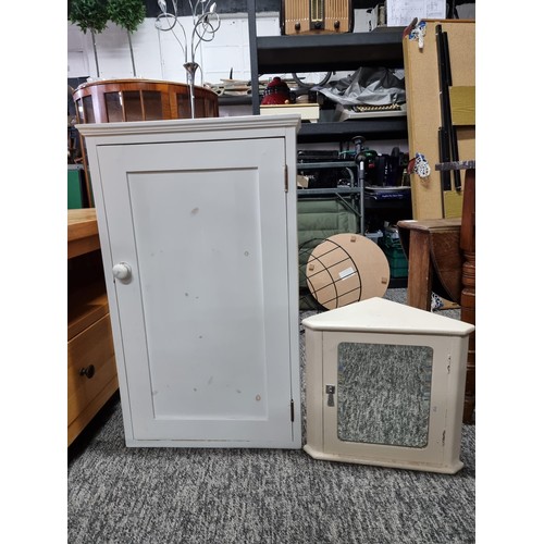 503 - A small vintage bathroom corner cabinet with bevel edged mirror along with a larger bathroom cabinet... 