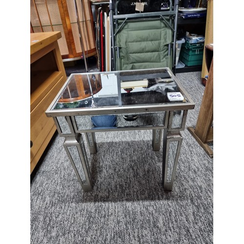 505 - Mirrored lamp table with a silver wooden frame having mirrored top leg and sides in good condition h... 