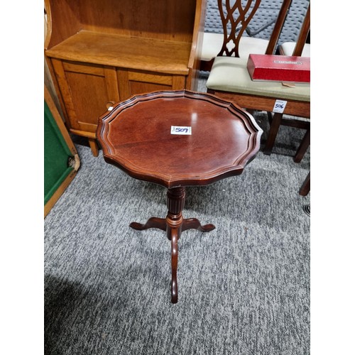 509 - Mahogany wine table on tripod legs in excellent clean condition with a clean top height 58cm diamete... 