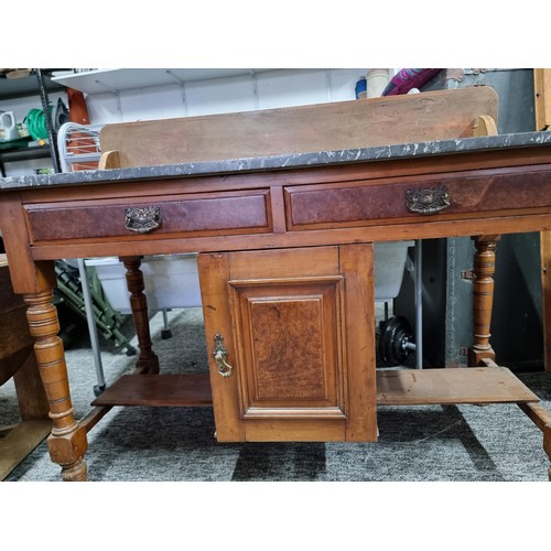 510 - Antique solid mahogany wash stand with a solid marble top featuring two drawers and one cupboard wit... 