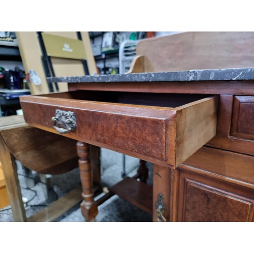 510 - Antique solid mahogany wash stand with a solid marble top featuring two drawers and one cupboard wit... 