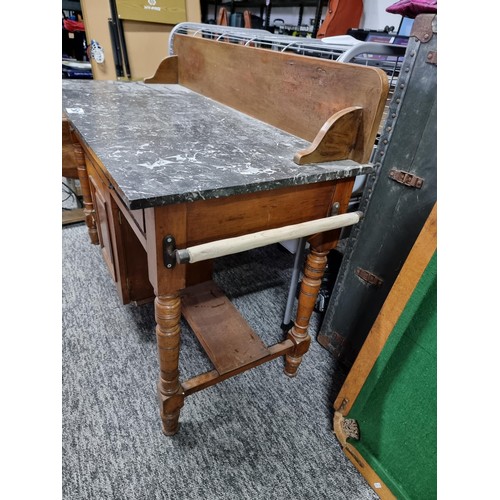 510 - Antique solid mahogany wash stand with a solid marble top featuring two drawers and one cupboard wit... 