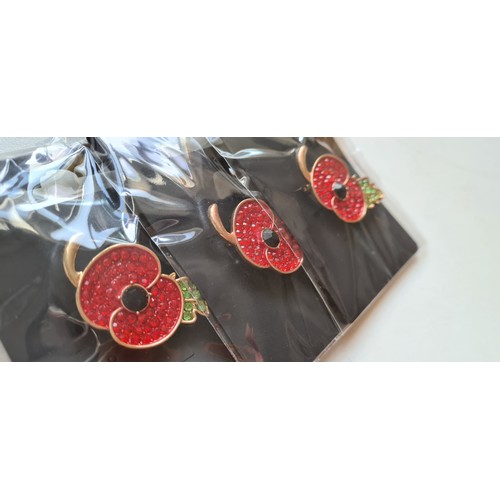 340A - 3x New And sealed gilt metal poppy brooches with a red and green jewelled design, which are sparkly ... 