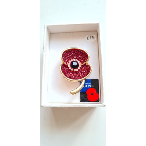 340B - Larger gilt metal poppy brooch, with green and red jewelled design, which are sparkly and lively and... 