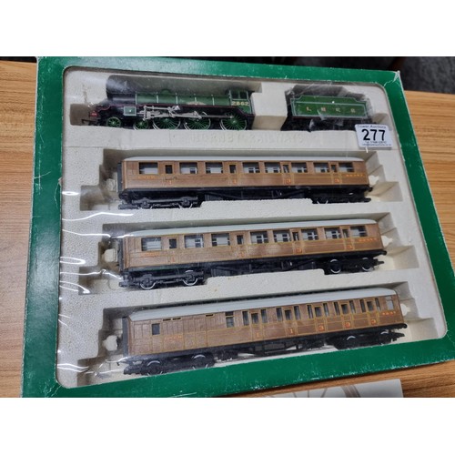 277 - A boxed Hornby R2017 Manchester United train pack LNER 4-6-0 class B17/4 loco and tender 2662 3 LNER... 