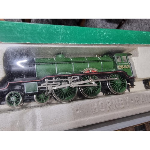 277 - A boxed Hornby R2017 Manchester United train pack LNER 4-6-0 class B17/4 loco and tender 2662 3 LNER... 