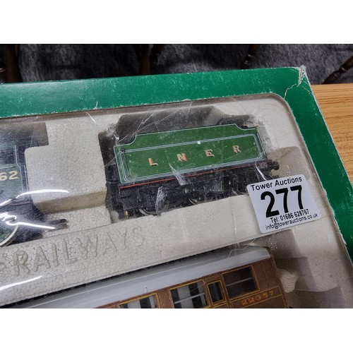 277 - A boxed Hornby R2017 Manchester United train pack LNER 4-6-0 class B17/4 loco and tender 2662 3 LNER... 