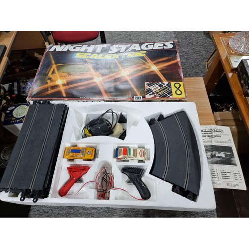 283 - A vintage Scalextric Night Stages set fully complete including its 2 cars, in very clean condition a... 