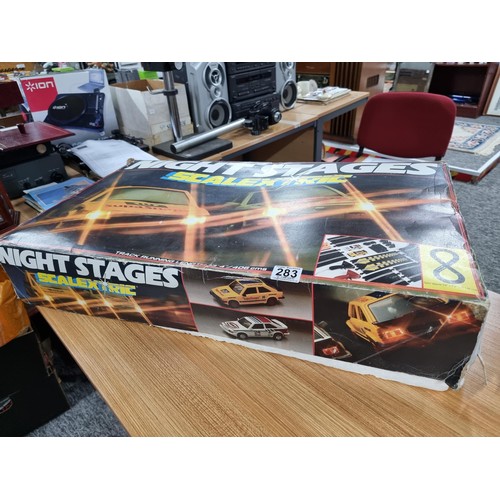 283 - A vintage Scalextric Night Stages set fully complete including its 2 cars, in very clean condition a... 