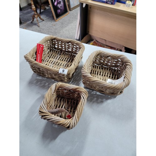 9 - Quantity of 3x graduated baskets along with a resin figure of a lady contemplating, and 2x plush cus... 