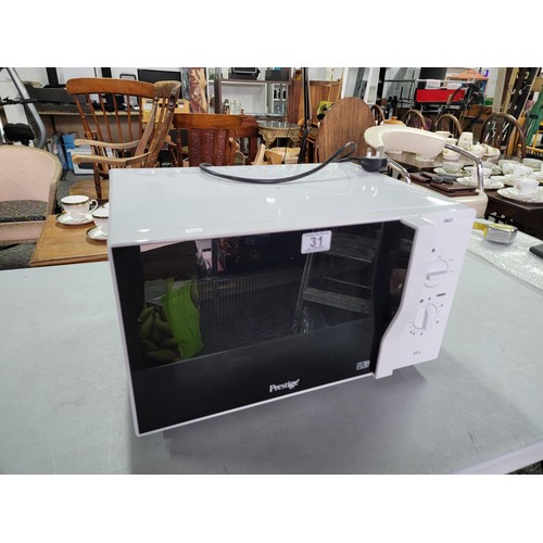 31 - Prestige microwave 23 litre 800W complete with instructions