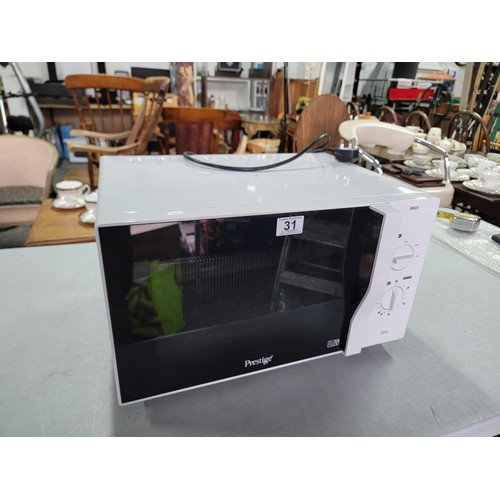 31 - Prestige microwave 23 litre 800W complete with instructions