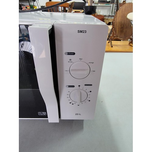 31 - Prestige microwave 23 litre 800W complete with instructions