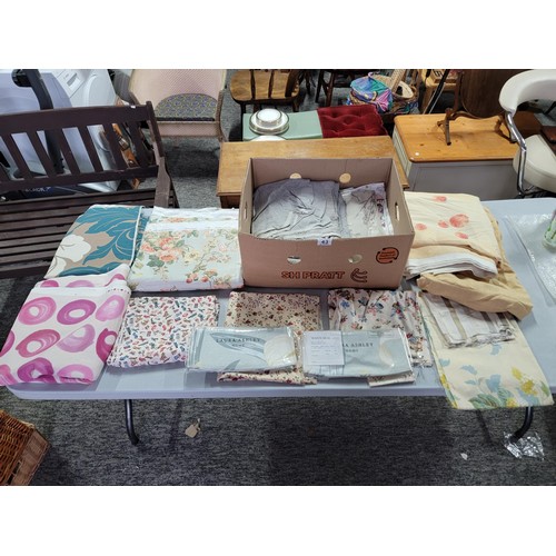 43 - Box containing a large quantity of fabric inc Laura Ashley material, Laura Ashley tie backs, along w... 