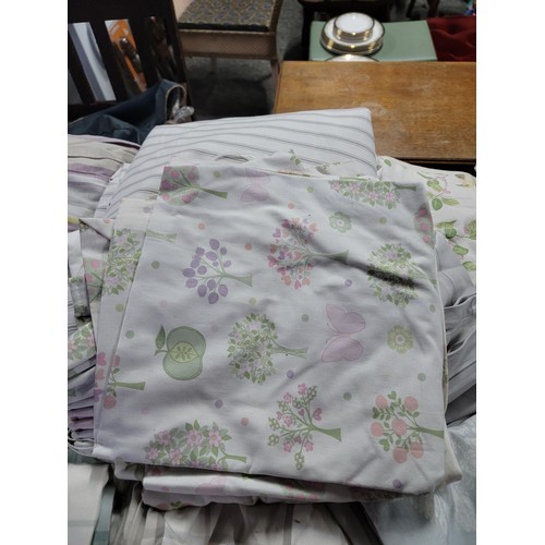 46 - Very large quantity of curtains inc a quantity of Laura Ashley curtains of various designs inc bird ... 